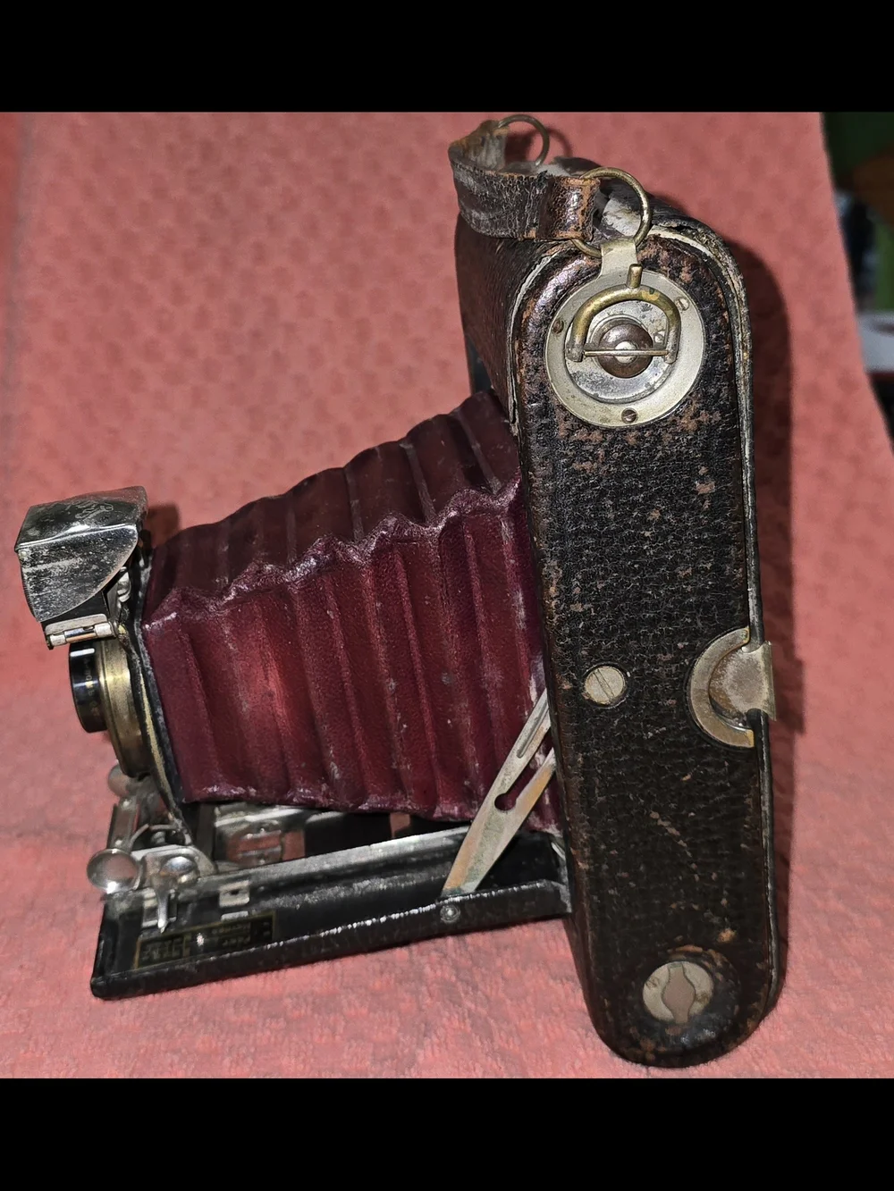 Vintage Folding Camera with Burgundy Bellows. Antique Eastman Kodak F.P.K. Autom